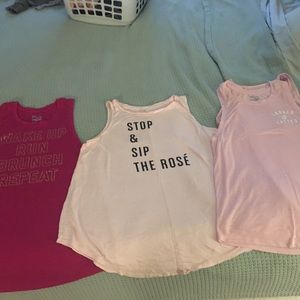 Three workout tops with cute sayings